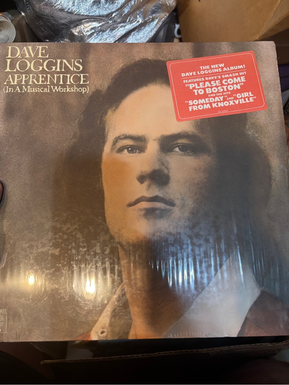 Dave Loggins Apprentice LP Vinyl record in a Musical workshop